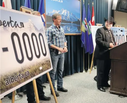 ?? Calgary Herald/Files ?? Two polls show nearly three-quarters of Albertans want the slogan Wild Rose Country to stay on the new licence plates, due out next year.