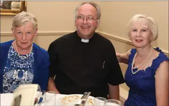  ??  ?? Bridget Sannia, Fr. Tom Gilroy and Maureen McBride