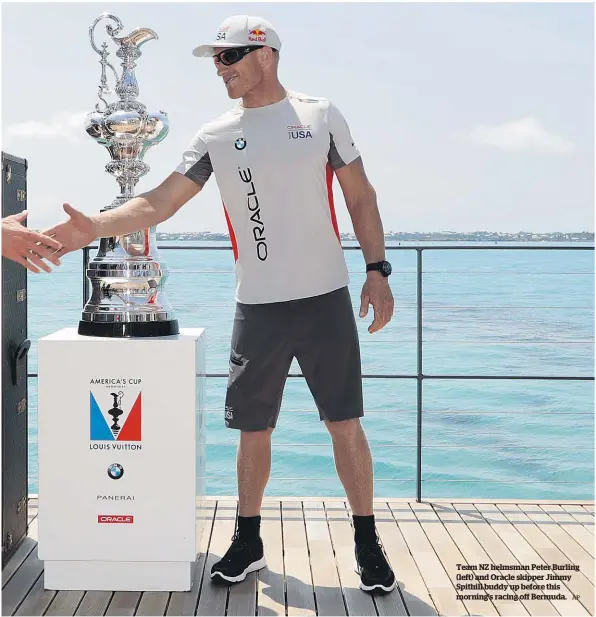  ?? AP ?? Team NZ helmsman Peter Burling (left) and Oracle skipper Jimmy Spithill buddy up before this morning’s racing off Bermuda.