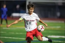  ?? DOUGLAS ZIMMERMAN/SPECIAL TO THE MARIN INDEPENDEN­T JOURNAL ?? Parker Mascott (10) of Marin Academy prepares to kick a ball against San Rafael in a nonleague soccer game at San Rafael High School in San Rafael, California on Dec. 13, 2022.