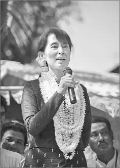  ??  ?? Suu Kyi is in a delicate relationsh­ip with the real power behind the throne.