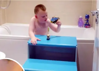  ??  ?? SPLISH SPLASH: Jake Green is using specially made steps for bathtime fun