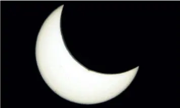  ?? POSTMEDIA NETWORK FILES ?? A partial solar eclipse as seen from Calgary on Oct. 23, 2014.