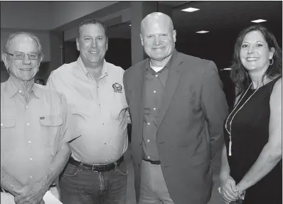  ??  ?? Emon Mahony of El Dorado, J.D. Neeley of Camden and Jeff and Susanna Crow of Malvern