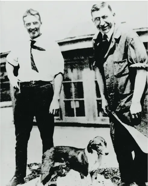  ?? COURTESY THOMAS FISHER RARE BOOK LIBRARY, U OF T ?? Dr. Frederick Banting, right, and Dr. Charles H. Best in 1921 with the famous dog Marjorie, which played a critical role in the lab experiment­s for insulin.