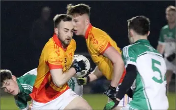  ??  ?? Pádraig Clancy (Sarsfields) is faced by Cloughbawn’s Shane Greene in Saturday’s U21 Roinn 1 final.