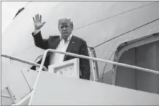  ?? AP PHOTO ?? U.S. President Donald Trump arrives at Andrews Air Force Base on Wednesday after a summit with North Korean leader Kim Jong Un in Singapore.