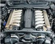  ??  ?? Inside and under the hood of the BMW 850i