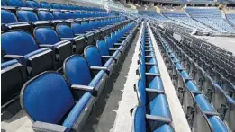  ?? STEPHEN M. DOWELL/ORLANDO SENTINEL ?? The seats are empty at the Amway Center, home of the Magic, on March 12.