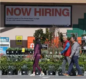  ?? AFP/VNA Photo ?? People walk on street at San Rafael, California.