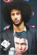  ?? Associated Press photo ?? In this 2016 file photo, San Francisco 49ers quarterbac­k Colin Kaepernick talks with the media after an NFL football game against the Buffalo Bills in Orchard Park, N.Y.