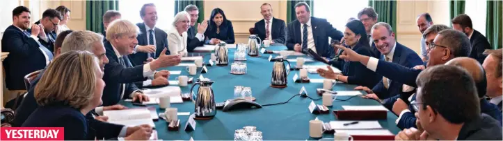  ?? ?? YESTERDAY
The smiles are back: Boris Johnson laughs and jokes with his newly assembled Cabinet team, shortly after delivering his resignatio­n speech outside Downing Street