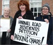  ??  ?? Marie Pigott, Caroline Gormley and Gemma Green residents from the Windmill Road protesting at Barlow House