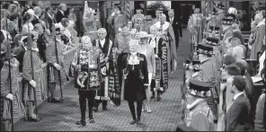  ?? AP/ALASTAIR GRANT ?? Gentleman Usher of the Black Rod, David Leakey (front right), leads the Queen’s procession through the Royal Gallery to the House of Lords during the State Opening of Parliament on Wednesday in London.