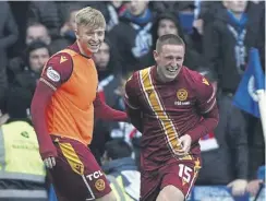  ?? ?? Dan Casey, right, celebrates after scoring Motherwell’s winner