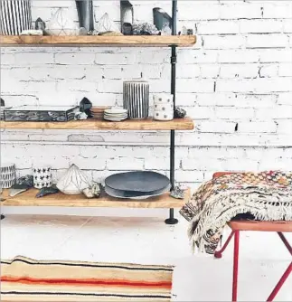  ?? Esqueleto ?? JEWELRY DESIGNER Lauren Wolf’s new Esqueleto boutique on Sunset Boulevard in Echo Park features handcrafte­d items such as custom jewelry and art plus vintage pieces like kilims.