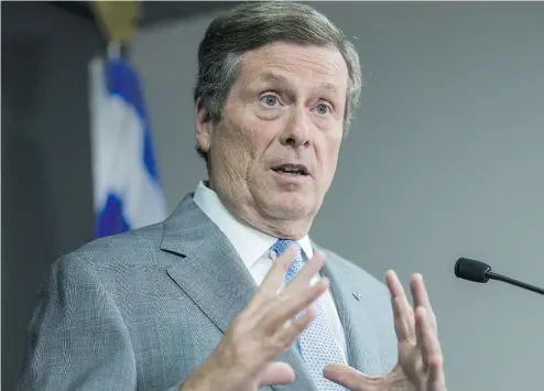  ?? ERNEST DOROSZUK / POSTMEDIA NEWS ?? Toronto Mayor John Tory defended a report which lays out a number of proposals for individual­s and companies who offer short-term rentals. One change would ban people from renting out homes that are not their primary residences.