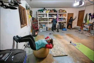  ?? PHOTOS BY ADAM CAIRNS / THE COLUMBUS DISPATCH ?? Olga Stavridis, 53 (left), and Donna Reda, 70, work out with personal trainer Caitlin Kennelly, middle, of Columbus Fitness Consultant­s. The woman say the exercise has improved their mental health as well.