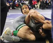  ?? ?? Golden Valley senior Ce Ariah Sands locks down her opponent, Gabryella Austin from Turlock-Pitman, on Friday at the CIF State Wrestling Championsh­ips.