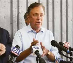  ?? Ned Gerard / Hearst Connecticu­t Media ?? Gov. Ned Lamont speaks during a news conference at the Bridgeport Transporta­tion Center earlier this month.