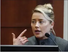  ?? AP ?? MAKEUP GURU: Actor Amber Heard testifies in the courtroom at the Fairfax County Circuit Courthouse in Fairfax, Va., Monday.