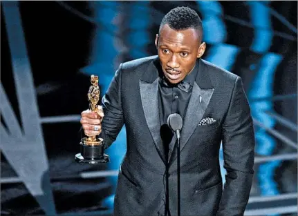  ?? CHRIS PIZZELLO/INVISION ?? Mahershala Ali accepts the award for best actor in a supporting role for “Moonlight” at the Oscars on Sunday at the Dolby Theatre in Los Angeles.