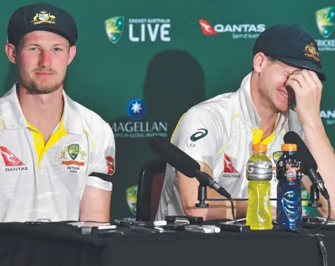  ?? Picture: DARREN ENGLAND/AAP ?? STRAIGHT BAT: Cameron Bancroft (left) was able to keep a straight face yesterday when fielding questions about England wicketkeep­er Jonny Bairstow’s dismissal, while skipper Steve Smith saw the funny side.