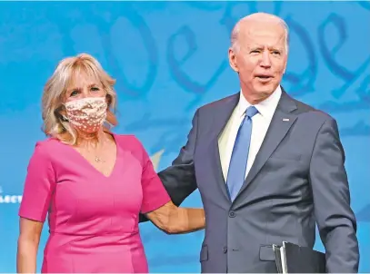  ?? Picture: AFP ?? FIRST COUPLE. US President-elect Joe Biden arrives with wife Jill Biden to deliver remarks on the Electoral college certificat­ion at the Queen Theatre in Wilmington, Delaware, last month.