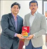  ??  ?? Union minister Col Rajyavardh­an Singh Rathore releasing the book