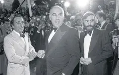  ??  ?? Michel Piccoli, centre, with Claude Brasseur, left, and Francis Girod in 1978.