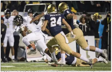  ?? (Arkansas Democrat-Gazette file photo) ?? Joe T. Robinson running back Hunter Smith (left) breaks through the Shiloh Christian defense during last year’s Class 4A state championsh­ip. Smith rushed for 1,922 yards and 19 scores in 2019.