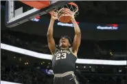  ?? NICK WASS — THE ASSOCIATED PRESS ?? Villanova forward Jermaine Samuels (23) dunks during the first half of an NCAA college basketball game against Georgetown, Saturday, March 7, 2020, in Washington.