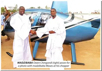  ?? ?? MADZIBABA Owen Chingondi (right) poses for a photo with madzibaba Moses at his chopper