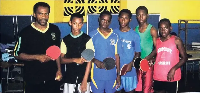  ?? FILE ?? Table tennis coach, Samuel Lamount (left), and some of his bright talents.