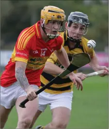  ??  ?? Jamie Myler of Horeswood is chased by Rathnure’s Ben Ronan.