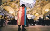  ?? CHARLIE RIEDEL AP FILE ?? Glenda Starke rallies against legislatio­n banning gender-affirming health care in March in Missouri.