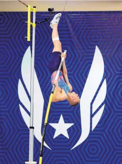  ?? JIM THOMPSON/JOURNAL ?? Sam Kendricks goes up and over the bar in the men’s pole vault Saturday at the USATF Indoor Championsh­ips Saturday.