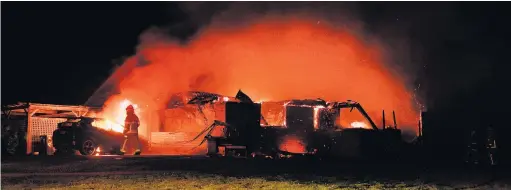  ?? PHOTOS: STEPHEN JAQUIERY ?? Flames engulf the Waitati house as firefighte­rs do what they can.