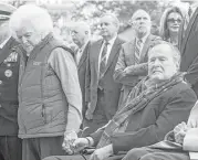  ?? Brett Coomer / Houston Chronicle ?? Barbara Bush, left, holds hands with her husband, former President George H.W. Bush. The couple attended a Pearl Harbor remembranc­e last month at the Bush Presidenti­al Library in College Station.
