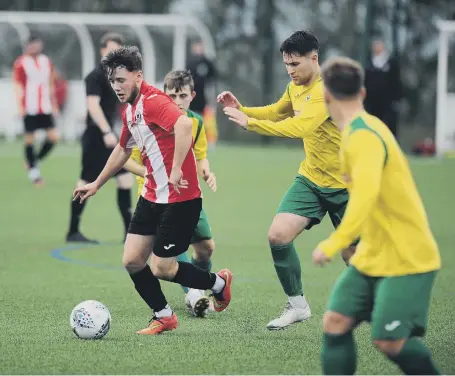  ?? ?? Sunderland West End (red/white) taking on Esh Winning at Ford Quarry Football Hub, last weekend.