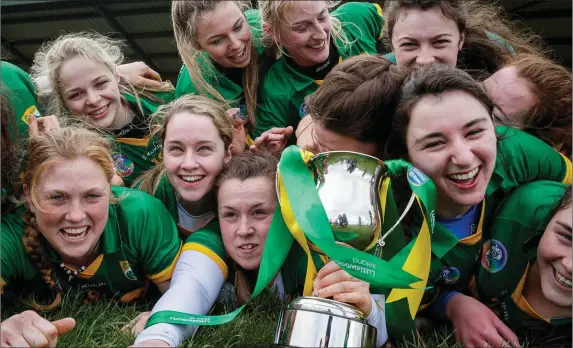  ?? Photo by INPHO/Ryan Byrne ?? Some Kerry players celebrate with the trophy after winning the Littlewood­s Ireland Camogie League Division 3 Final against Roscommon at The Ragg, Co. Tipperary last Sunday. See page 53 for report and reaction