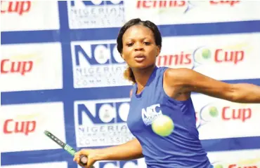  ??  ?? Ronke Akingbade of the Team Muller in action against Team VGC Lions last Saturday in the NCC Tennis League