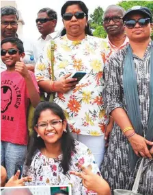  ??  ?? Above: The three siblings and their families had their last get-together with their father last July after a gap of six years.