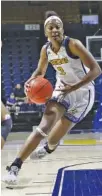  ?? STAFF PHOTO BY TROY STOLT ?? UTC forward Eboni Williams drives to the basket during Saturday’s game against Western Carolina at McKenzie Arena.