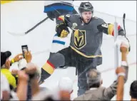  ??  ?? A revved up Jonathan Marchessau­lt draws cheers from Knights fans after his goal 35 seconds into Game 3, a 4-2 victory over the Winnipeg Jets.