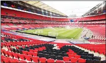  ??  ?? A general view of the action during the English League Two Play-Off Final soccer match between Exeter and Northampto­n, at Wembley Stadium, in London, June 29, 2020. The English Football Associatio­n is set to make 82 people redundant as it faces a shortfall of 300 million pounds ($370 million) over four years due to the coronaviru­s pandemic shutting down the sport and restarting without fans in stadiums. Wembley Stadium was due to be staging seven games at the European Championsh­ip including the semifinals and finals next month but the tournament was postponed by a
year. (AP)