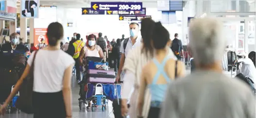  ?? ALLEN MCINNIS FILES ?? Fully vaccinated internatio­nal travellers do not have to take a COVID-19 test upon arrival in Canada, unless they are randomly selected.