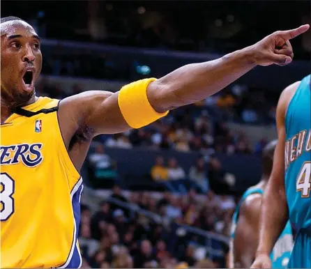  ??  ?? Kobe Bryant plays for the Lakers. The reaction to his death split opinion