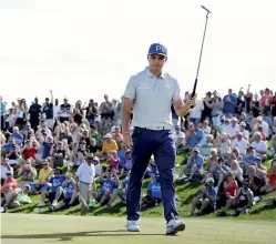  ??  ?? Rickie Fowler makes a birdie putt on the 10th hole during the second round of the Waste Management Phoenix Open at TPC Scottsdale in Scottsdale, Arizona - AFP