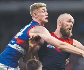  ?? ?? Bulldog Tim English rucks against Demon Max Gawn. Picture Getty